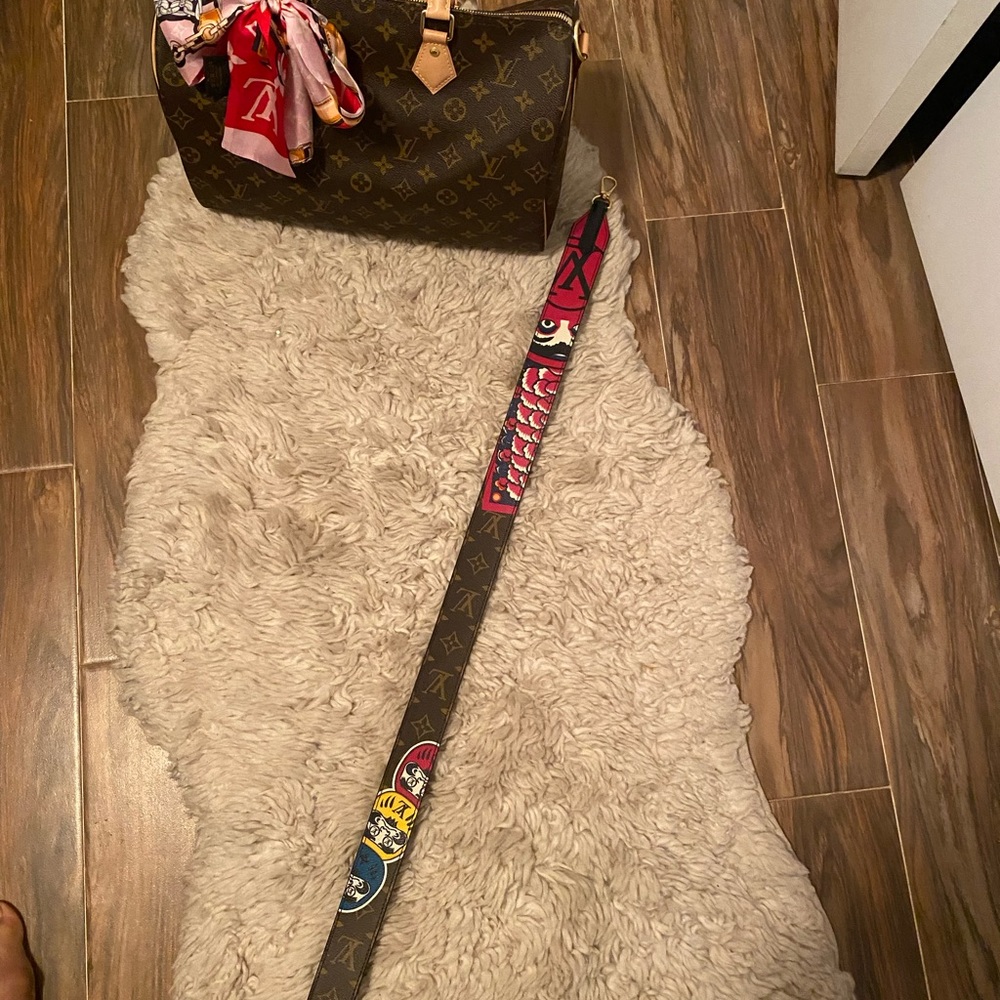 New never worn speedy Bandouiliere 35